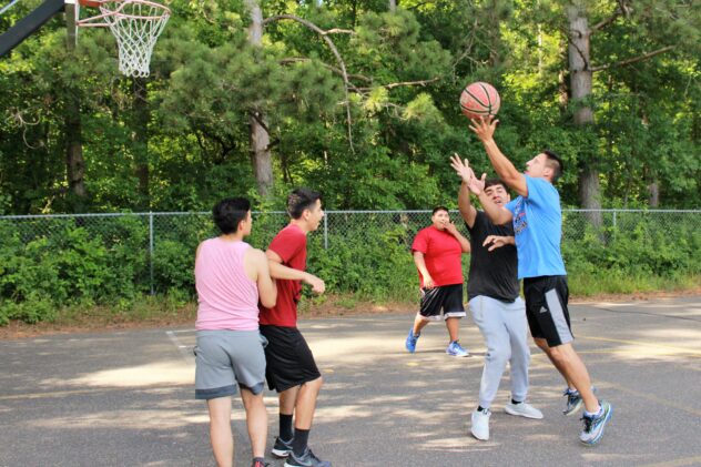 Boys playing basketball