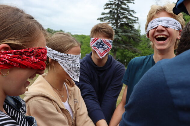 Laughing during a teambuilding challenge